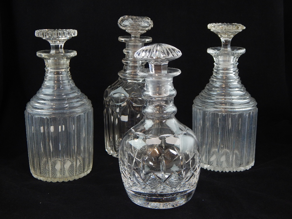 Mid 19th century clear glass decanter, mallet form with triple ring neck and cut faceted body,