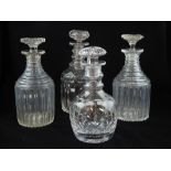 Mid 19th century clear glass decanter, mallet form with triple ring neck and cut faceted body,