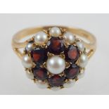 9ct yellow gold garnet and pearl flowerhead cluster ring.