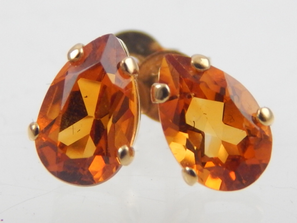 Pair of 10ct yellow gold citrine ear studs.