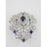 An antique Art Deco sapphire and diamond brooch in white gold circa 1920.