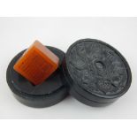 Chinese soapstone seal and circular ink stone box.