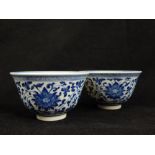 Pair of Chinese blue and white porcelain cups, chrysanthemum and scrolling leaf design to exterior,