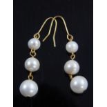 Pair of 14ct yellow gold graduated pearl drop earrings.