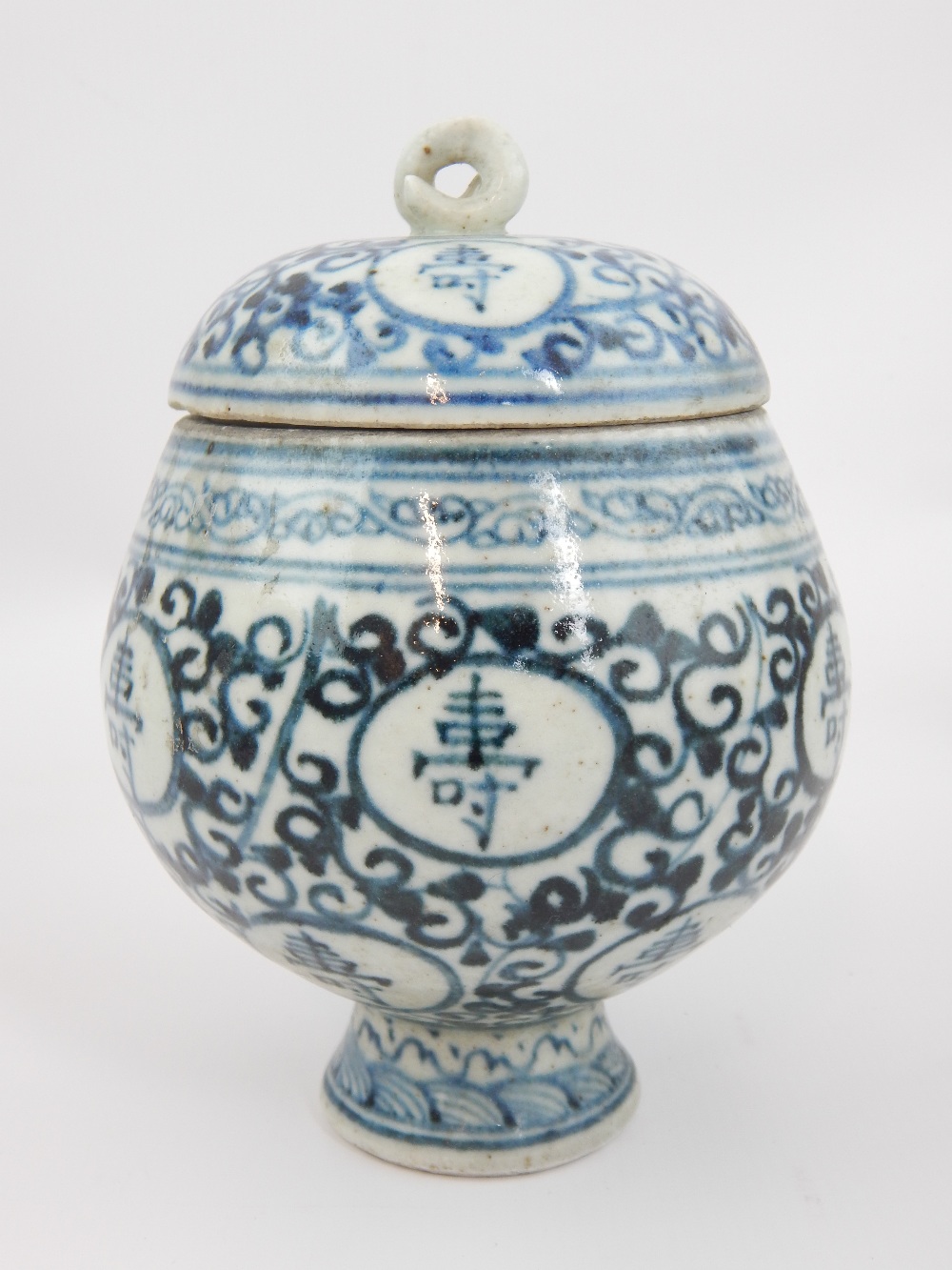 Chinese lidded pot, roundels with character writing, all over trailing, approx 16 x 12cm dia.