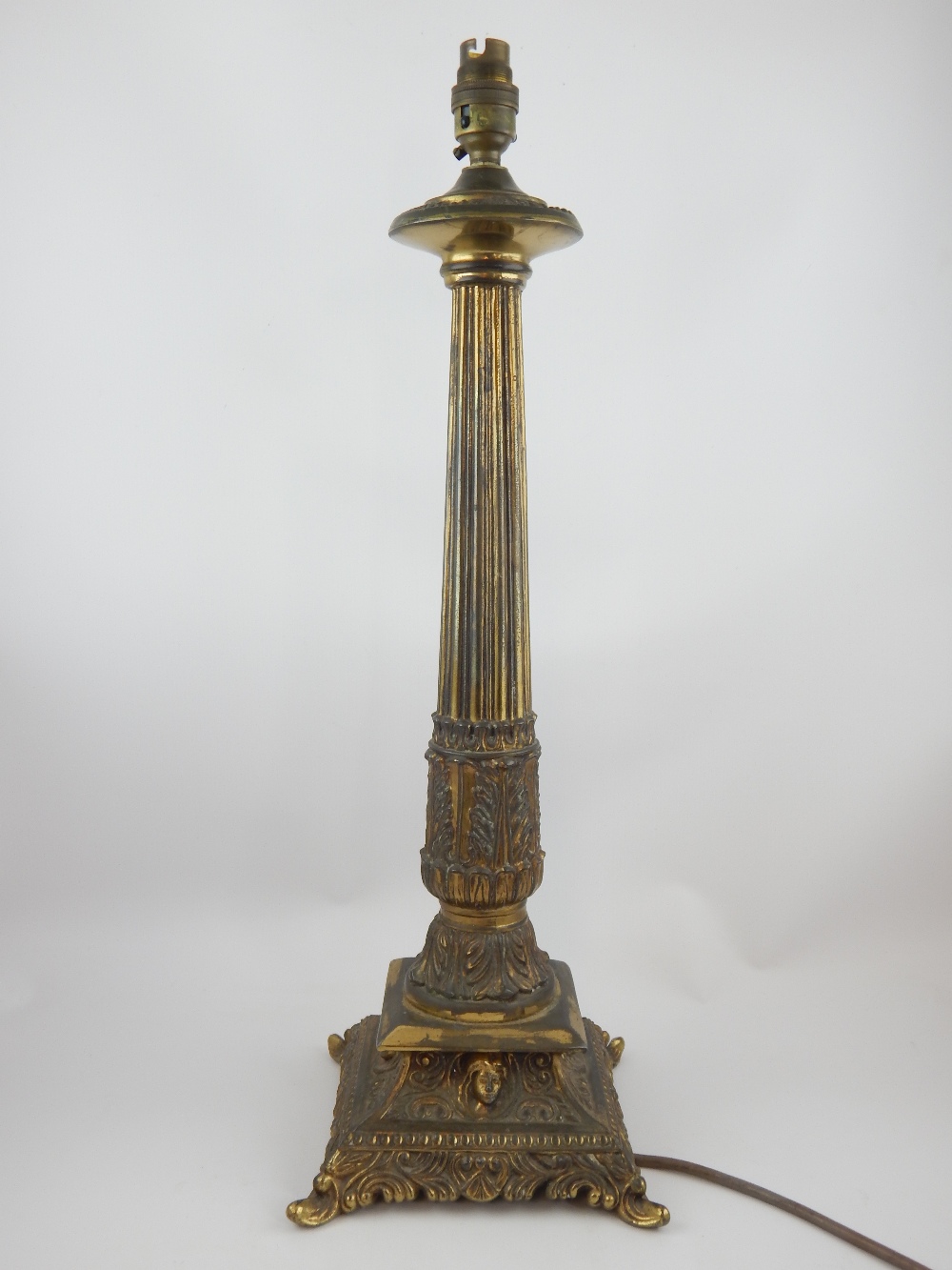 Victorian style cast brass table lamp with acanthus fluted column.