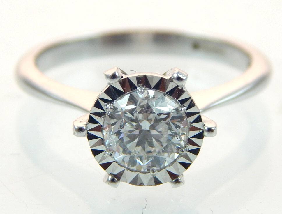 18ct white gold diamond solitaire ring, the claw set stone 0.9ct, colour E/SI.