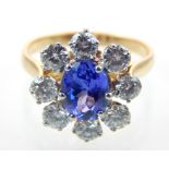 18ct yellow and white gold tanzanite and diamond cluster ring.