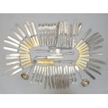 Extensive assortment of silver plate cutlery including knives, forks,
