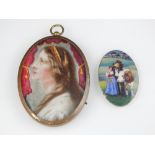 Dutch enamel on white metal oval, study of farmer, daughter and cow, 5cm h.