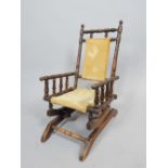 Early 20th century American turned beech children's rocking chair.