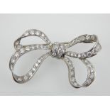 An antique diamond brooch in 18ct white gold,