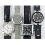 Four modern gentlemen's watches of varying design.