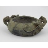Chinese bronze censer with two dragons, impress stamp to base, approx 10cm dia.