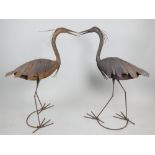 Pair of aged metal garden ornaments of standing heron, 110 cm h.