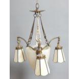 20th century ceiling light with a domed alabaster pendant and three cream glass pendant shades,