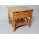 A satin birch rectangular low table with two frieze drawers (one fitted) raised on square section