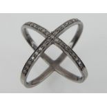 Black rhodium and diamond cross-over ring.