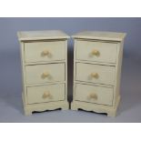 Pair of shabby chic painted bedside chests of three drawers.