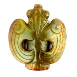 A good Hongshan style carved jade pendant depicting a stylised Chinese bird in green opaque jade,