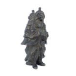 A heavy solid cast bronze group of a pair of Chinese warlords standing back to back, praying, in