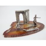 Silver figural composition of the Opera 'Carmen', mounted on agate base, each piece indistinctly