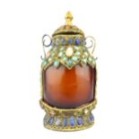 A Sino-Tibetan gilt metal mounted agate snuff bottle studded with cabouchon stones, 10cm high.