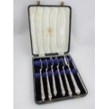 Cased set of six modern Kings pattern silver handled deli or prosciutto forks, Harrow Brothers.