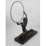 After Ferdinand Preiss, an Art Deco bronze figurine of female hoop dancer, set on black marble base,