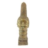 20th C bronze patinated Benin head of a queen with tall conical lattice headdress, pronounced