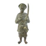 A Chinese bronze figure of a bearded warrior with conical hat and holding a sword, 18cm.