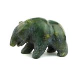 A rare Chinese archaic form dark green pebble jade bear, 5 x 8cm.