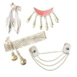 A collection of various silver jewellery to include necklaces, bracelets, earrings, brooches, etc.
