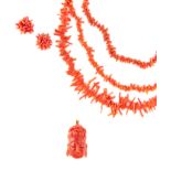 Three naturalistic coral necklaces of varying lengths, each consisting of a single strand,