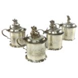 Four Antique Sterling Silver mustard pots three by Goldsmiths & Silversmiths Company Ltd,