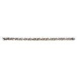 A diamond link bracelet in 18ct white gold,