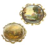 Two antique landscape miniature brooches in gilt metal, of oval form with scrolling borders.