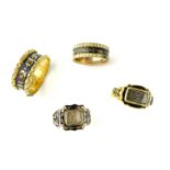 Four antique Georgian, Victorian & later mourning rings in 9 and 18ct yellow gold,