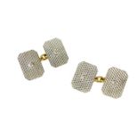 A pair of Art Deco diamond dress cufflinks in 18ct yellow gold and platinum,