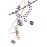 A large selection of amethyst and silver jewellery to include three bracelets, two necklaces,