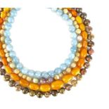 A natural amber bead necklace the single string of oval polished beads varying in size,