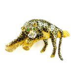 A vintage Cartier style jewelled leopard brooch in 14ct yellow gold,