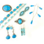 A collection of turquoise jewellery set in sterling silver, to include earrings, necklaces,