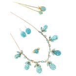 A collection of turquoise jewellery set in sterling silver and gilt metal, including necklaces,