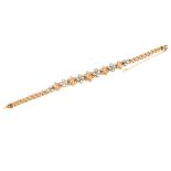 An antique coral, pearl & diamond bracelet set in yellow gold,