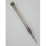 Silver seal top propelling pencil by Sampson Morden & Co. of ribbed form, the matrix carved with