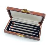 Boxed set of four whist marker pencils,