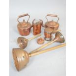 Collection of late 19th / early 20th century copperware, including two kettles, a wash dolly and a