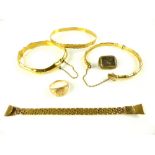 Yellow metal bangle modelled as bamboo, stamped 18ct, together with a similar bangle stamped 22ct, a