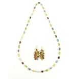 14ct yellow gold tourmaline and garnet necklace set with oval faceted stones with a pair of matching